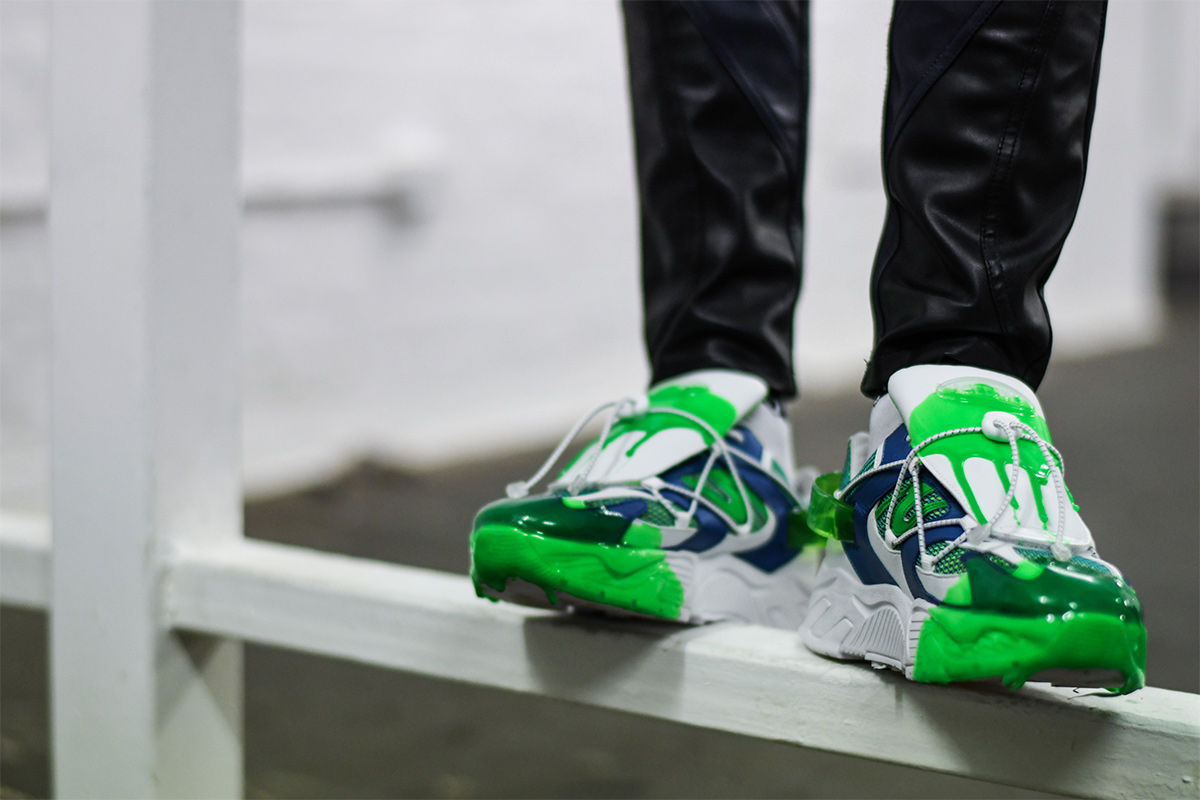 chunky iceberg sneakers with green drip effect